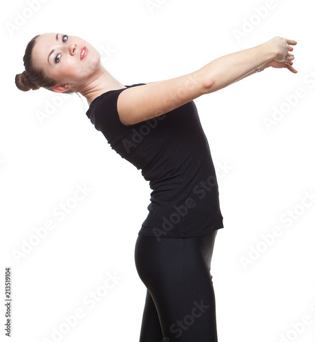 Beautiful young woman dancing in studio ballet.