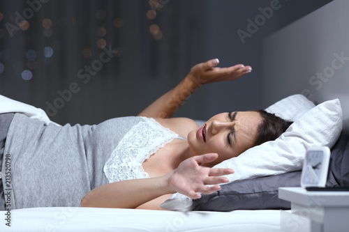Woman having a nightmare in the night photo