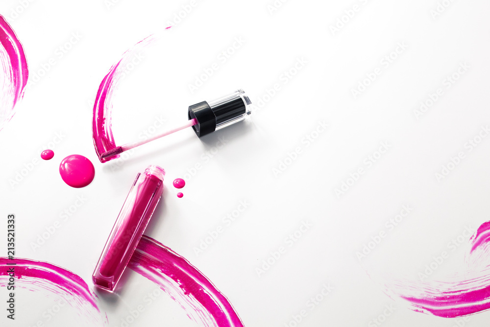pink gloss lipstick with brush color cosmetic on white background pink gloss lipstick with brush color cosmetic on white background