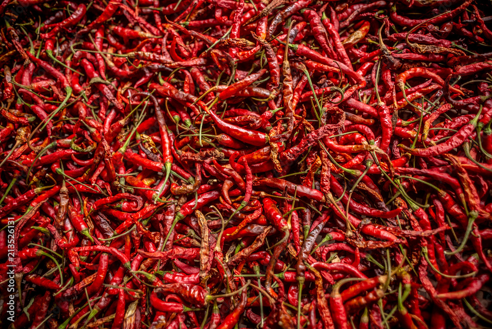 Fototapeta premium Dried Chilii in countryside in thailand, processing of Cayenne pepper for cooking Thai food.