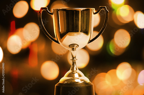 Winner trophy with abstract bokeh light background
