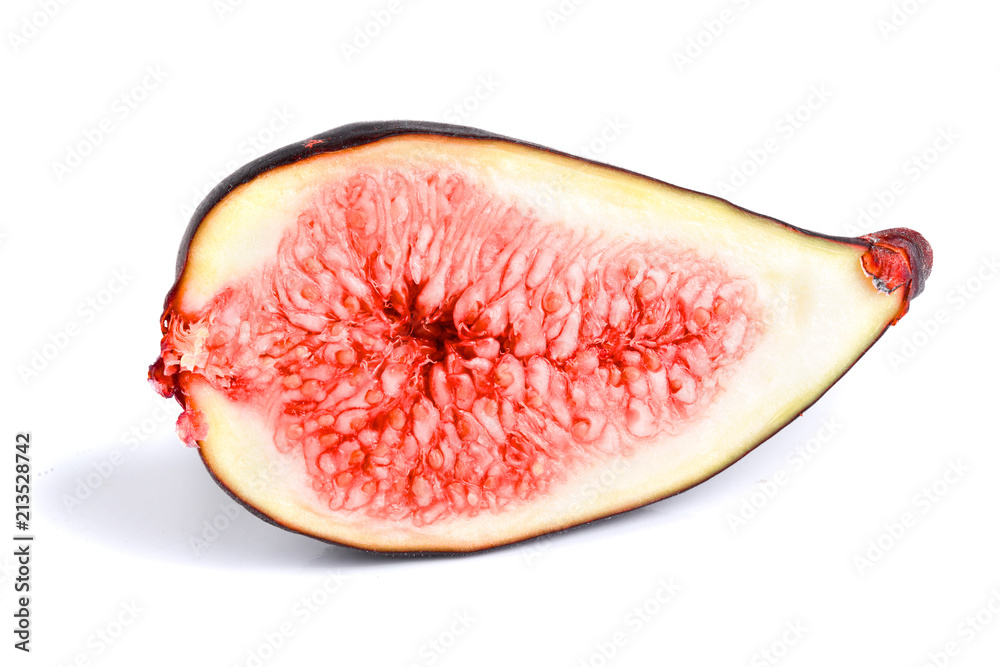 half of fresh fig fruit isolated on white background