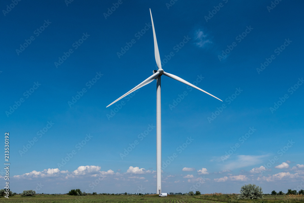Fototapeta premium Wind turbines electricity blue sky