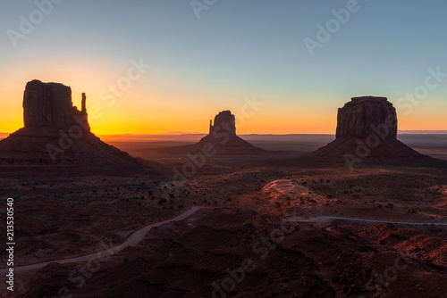 East and West Mitten Buttes  and Merrick Butte at sunrise  Monument Valley Navajo Tribal Park on the Arizona-Utah border  USA