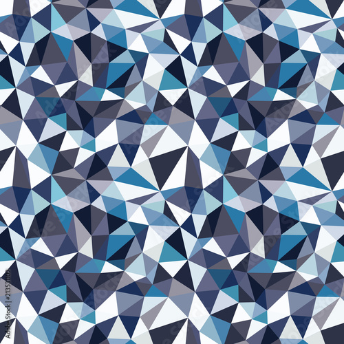 Abstract seamless pattern of triangles. Mosaic from the fragments of geometric shapes.