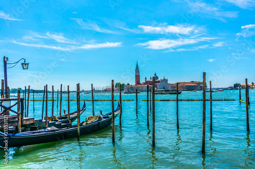Gondolas in Traghetto Gondole Molo in Venice, Italy 