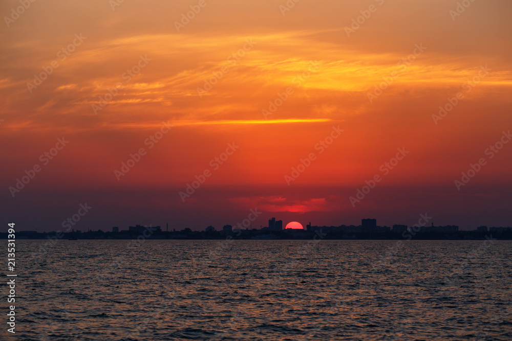 beautiful sunset leaving sun in the sea beautiful postcard