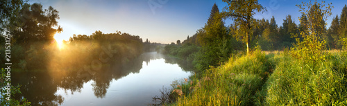 summer landscape panorama with river and sunrise