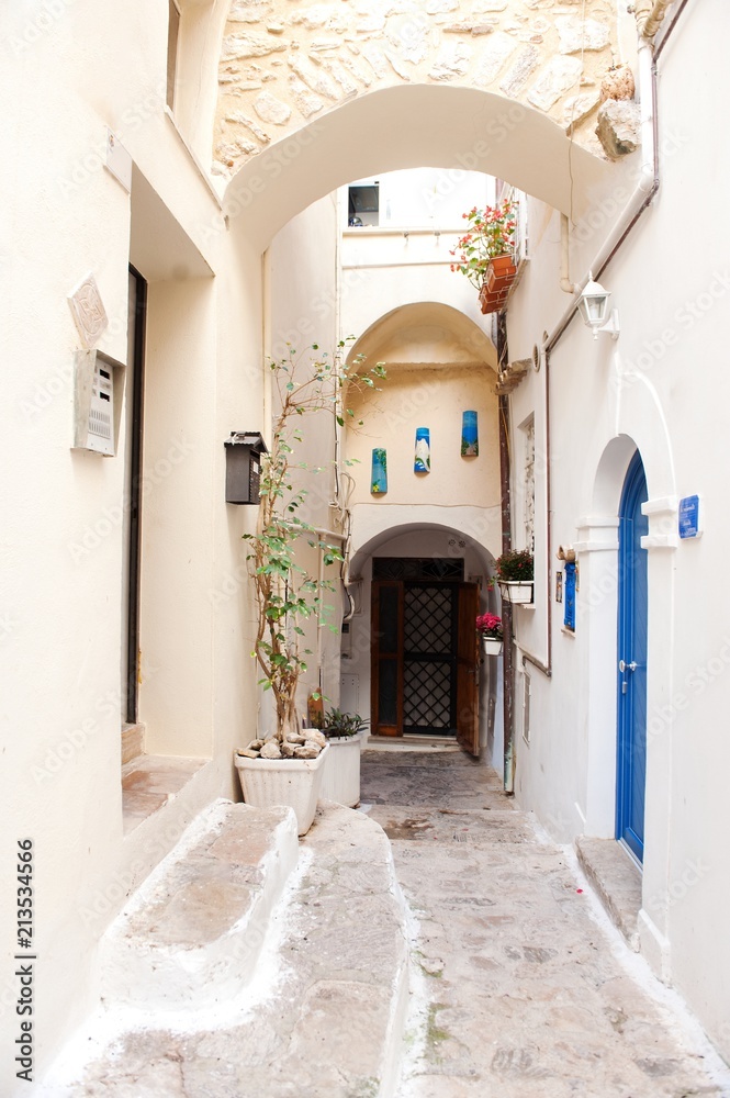 Atmospheric narrow streets in the historic center of Sperlonga in central Italy.
