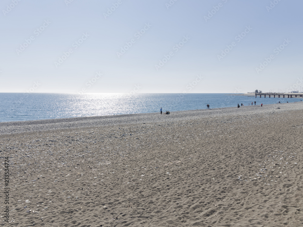 people by the sea and sunlight people by the sea and sunlight