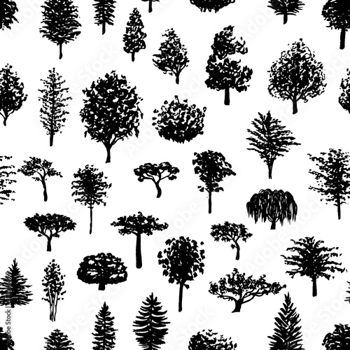 Forest trees silhouettes seamless pattern