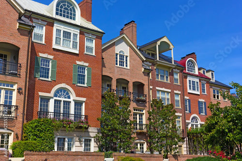 Modern houses facing Old Town Alexandria waterfront in Virginia, USA. Highly sought after residential development in Alexandria neighborhood. © avmedved