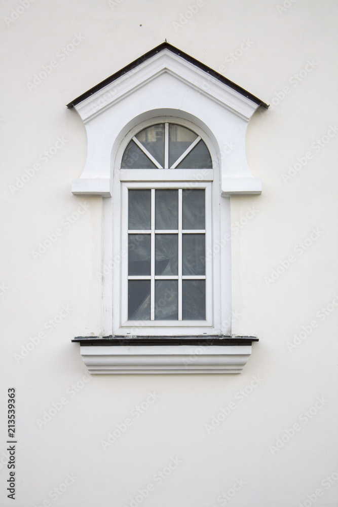 Obraz premium Photo of old cozy single window on old wall