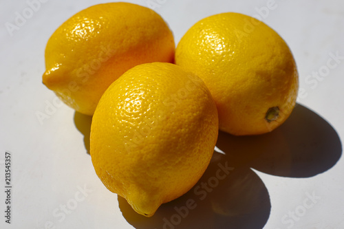 three lemons on the table