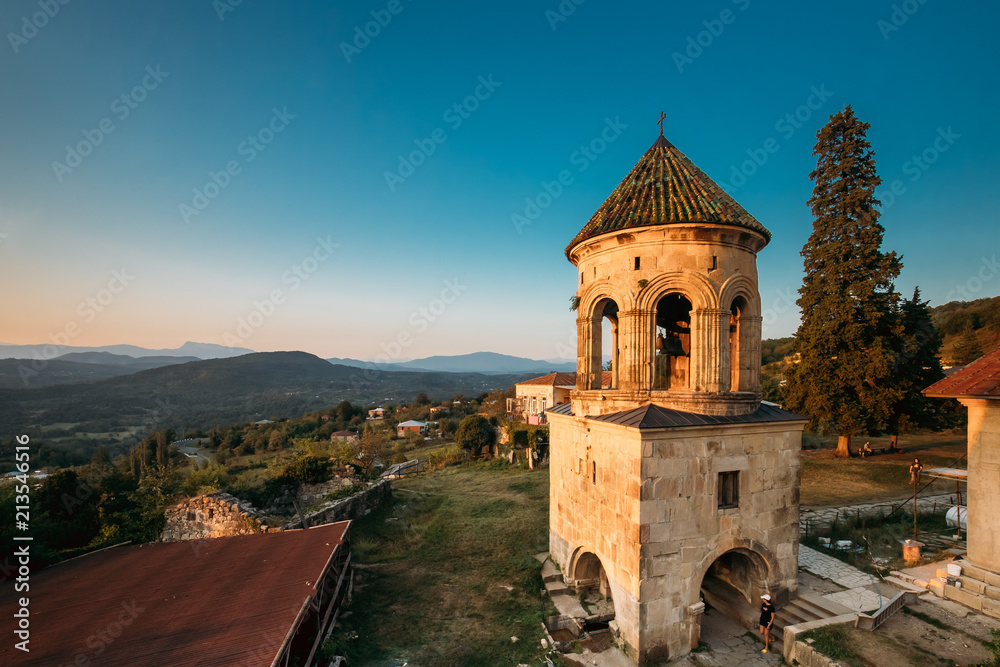 Kutaisi, Georgia. Bell Tower Of Gelati Monastery In Evening Time