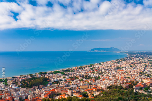Panoramic sea landscape with Terracina, Lazio, Italy. Scenic resort town village with nice sand beach and clear blue water. Famous tourist destination in Riviera de Ulisse © oleg_p_100