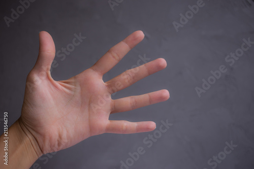woman hand with manicure showing the number five of fingers