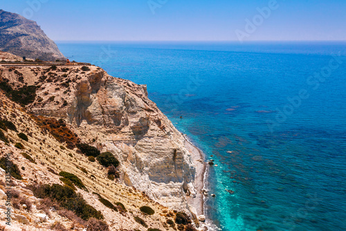 Panoramic landscape Petra tou Romiou  The rock of the Greek   Aphrodite s legendary birthplace in Paphos  Cyprus island  Mediterranean Sea. Amazing blue green sea and sunny day.