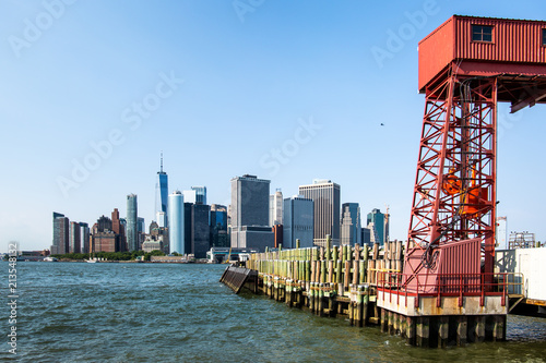 New York City / USA - JUL 14 2018: Governors Island entrance view from ferry on a clear afternoon photo