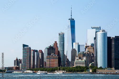 New York City   USA - JUL 14 2018  Lower Manhattan Skyline view from Governors Island ferry on a clear afternoon