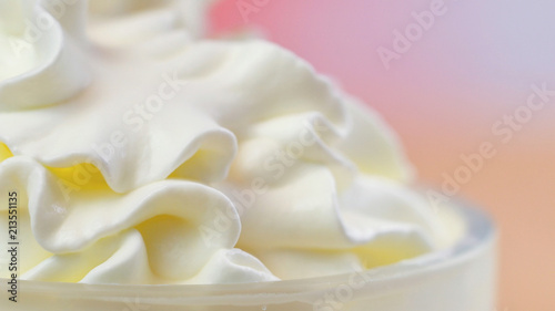 Canvas Print Swirls of whipped cream, macro closeup preparation for cake decorating