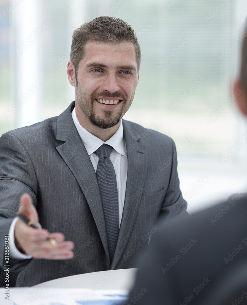 closeup.Manager and client discussing the terms of the contract in the office. closeup.Manager and client discussing the terms of the contract in the office.