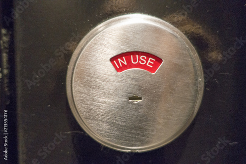 bathroom, water closet, lavatory in use, occupied 