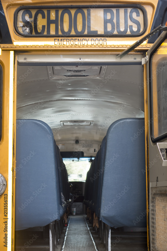 back of a school bus with escape door open in the back no people Stock  Photo | Adobe Stock