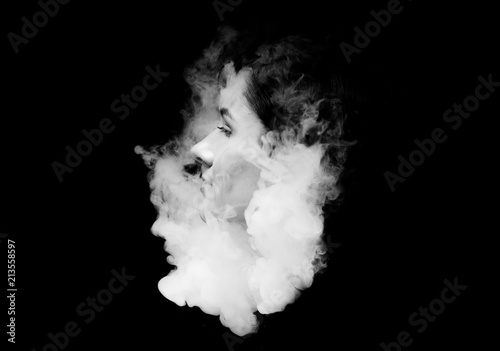 creative of art woman portrait and smoke in face. black in white portrait and smoke on black background.