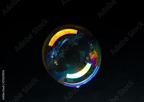 one soap bubbles isolated on black background. © Sergey