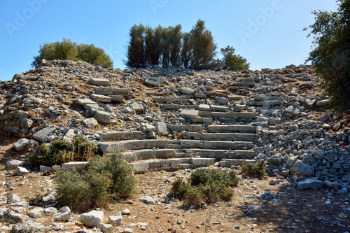 Ruins of amphitheatre in Amos ancient site near Marmaris resort town in Turkey. photo