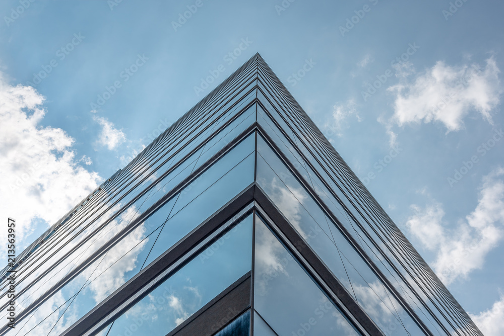 Sky and clouds reflected in modern building windows Sky and clouds reflected in modern building windows