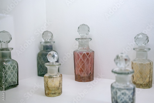 colorful vintage retro glass bottle against white background