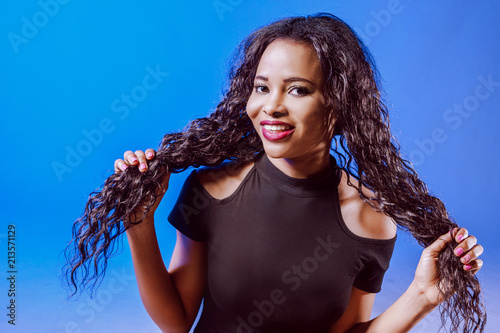 Girl with long hair. Black ...