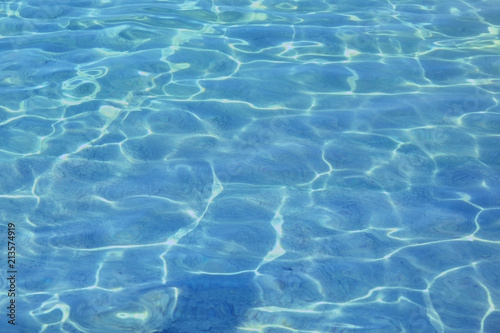 surface of blue swimming pool. Background water in sea.