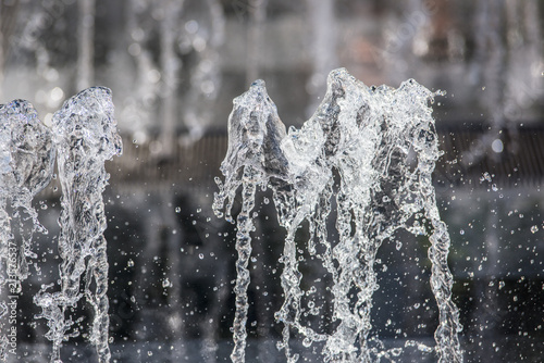Close-up of small splashing dancing fountains