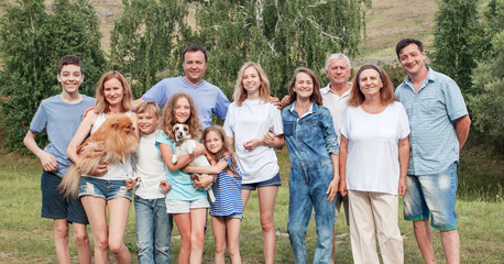 Happy big family outdoors
