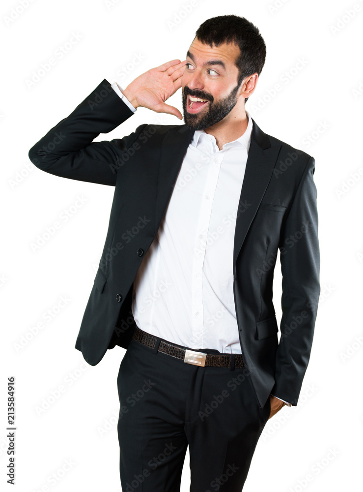 Fototapeta premium Handsome businessman listening something