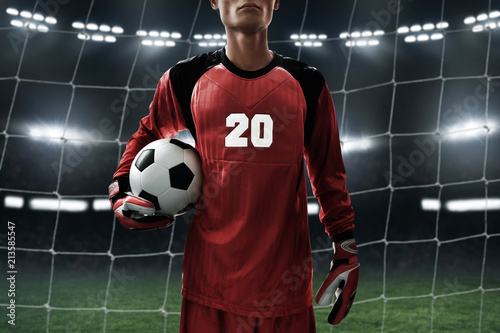 Soccer goalkeeper holding soccer ball © fotokitas