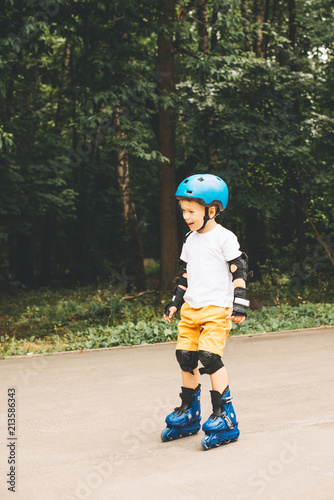 Boy riding on roller skates at outdoor park