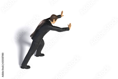 toy miniature businessman pushing, figurine concept isolated with shadow on white background