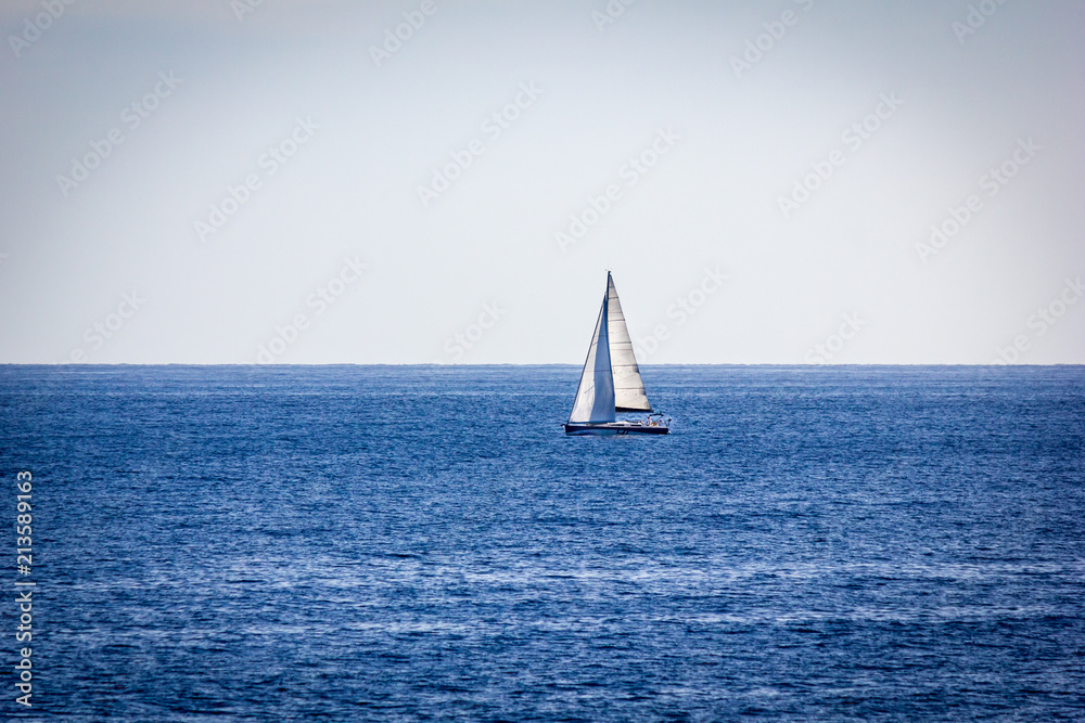 Sailing boat in the ocean