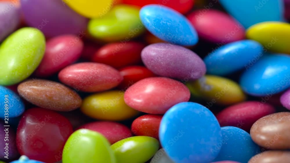 Macro closeup of multi color candy and jellies, dolly shot. Macro closeup of multi color candy and jellies, dolly shot.