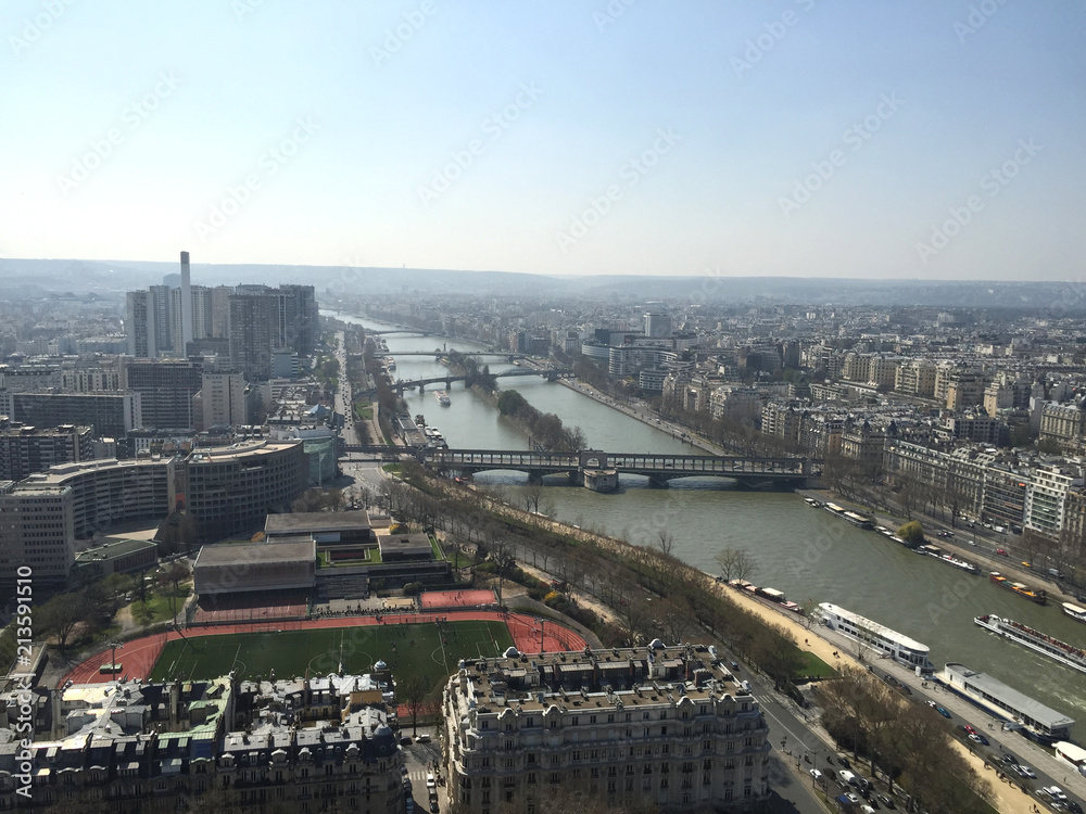 Aerial panoramic cityscape view of Paris, France from the Eiffel tower on a spring