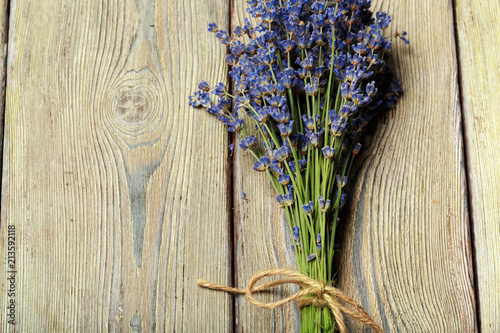 Bunch of dried lavender on wooden background