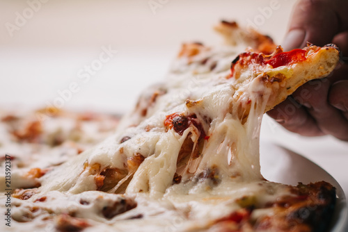 Pizza Serving Slice Melted Cheese Puling Hand Background