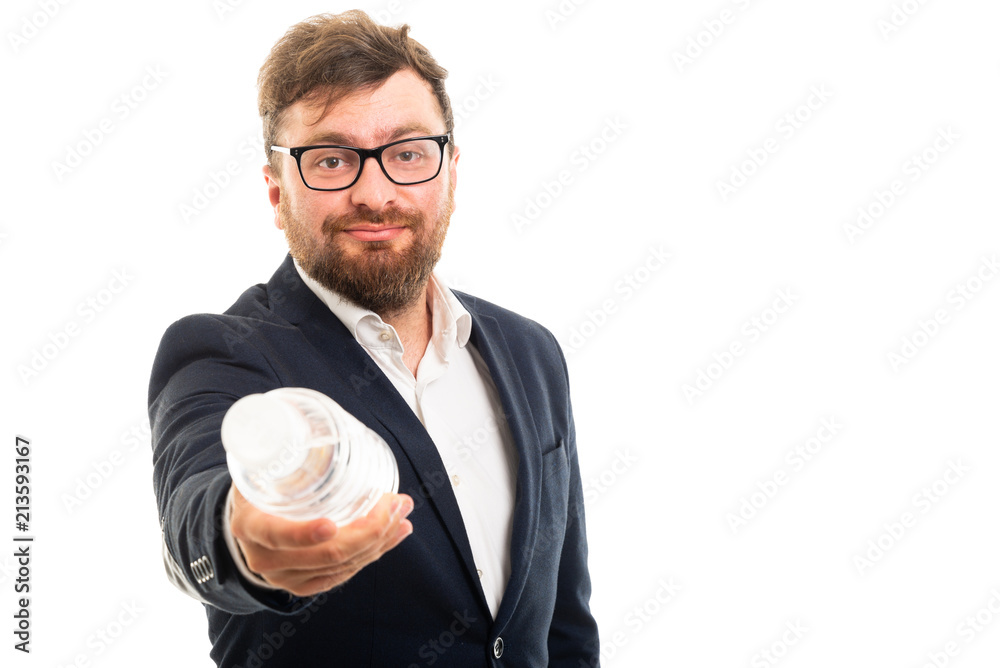 Portrait of business man handing a bottle of water. Portrait of business man handing a bottle of water.