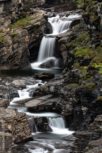 Beautiful cascade streaming in nature in Lyngenfjord  Norway.