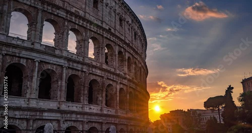Rome Colosseum Sunrise on the Horizon. Colosseum Sunrise Landmark in City Center Timelapse 4K. 