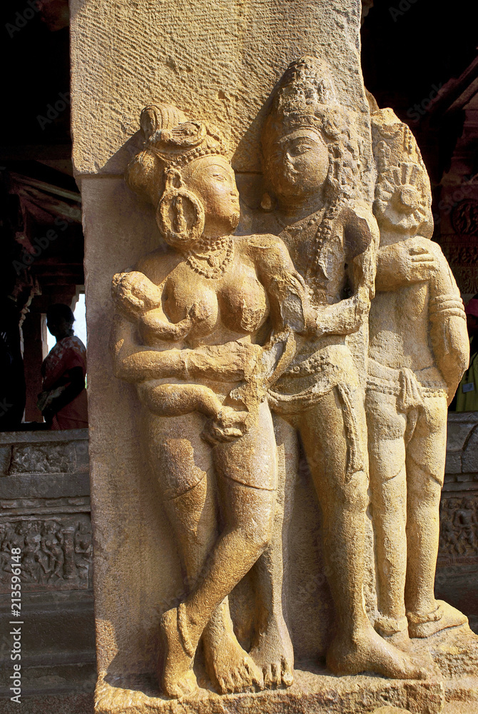 Carved figures on the sober and square pillars of the entrance porch of Durga temple, Aihole, Bagalkot, Karnataka. The Mithuna couple. The Galaganatha Group of temples.